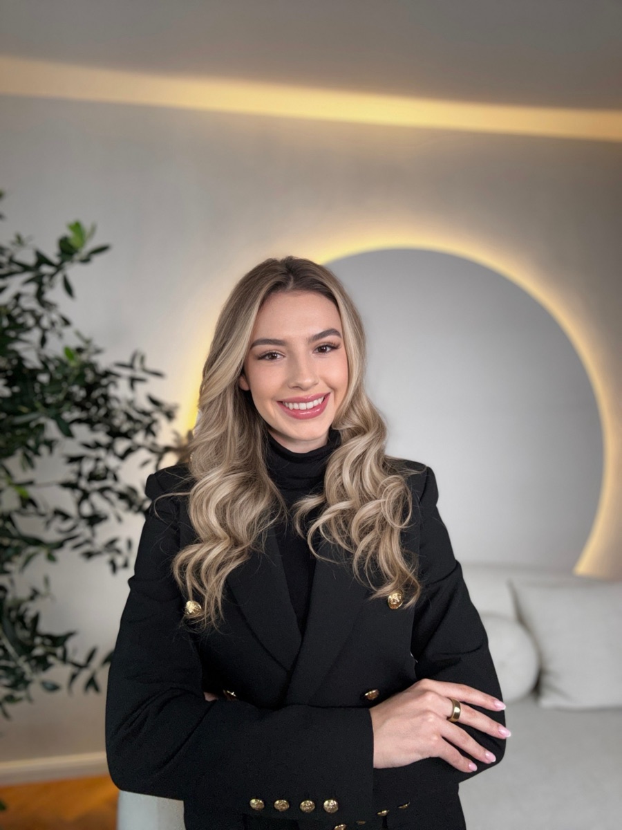 Teo Lupea, smiling, in a black blazer